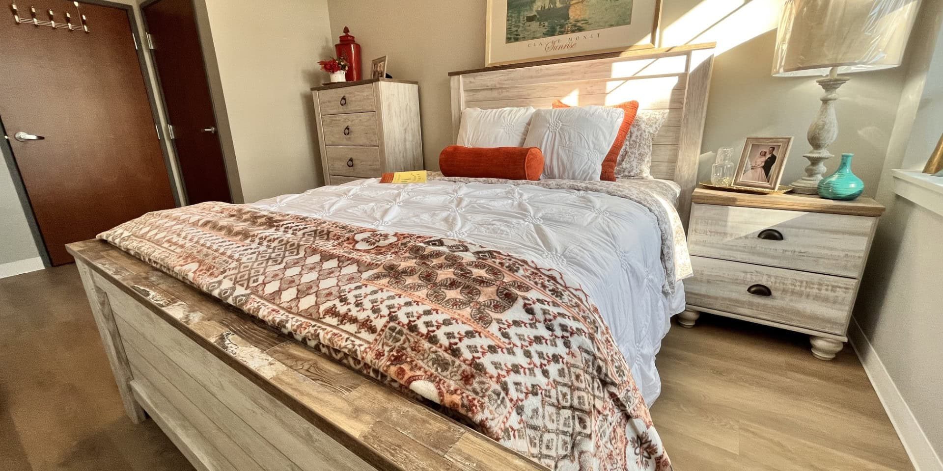 Comfortable bedroom in Bella Largo Senior Living community.
