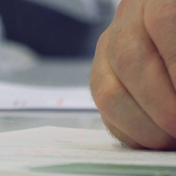 Person reviewing Medicare coverage options for assisted living and memory care services.